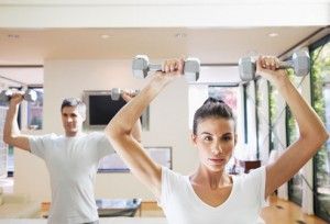 getty_rf_photo_of_couple_in_home_gym