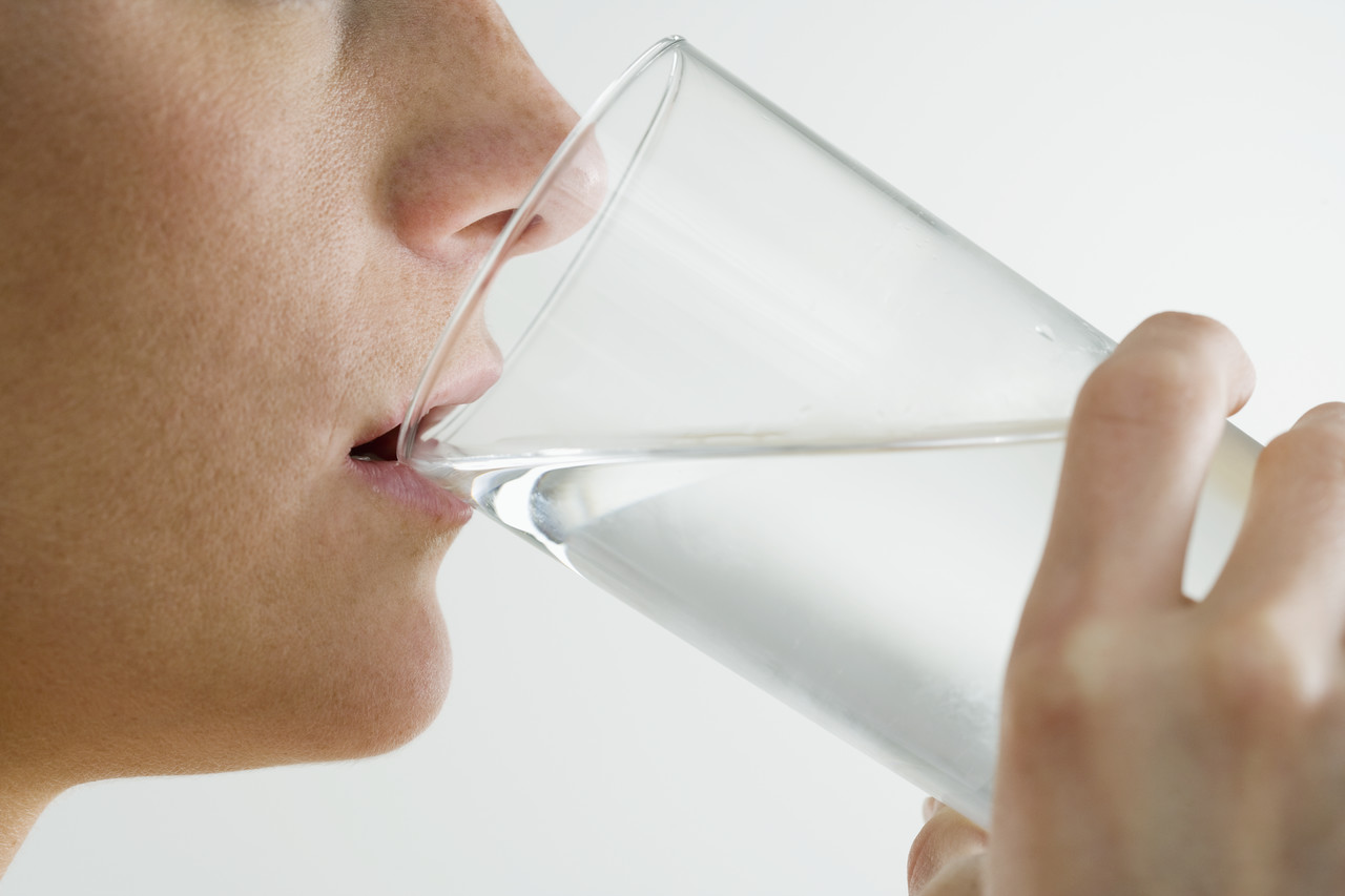 Woman Drinking Glass of water